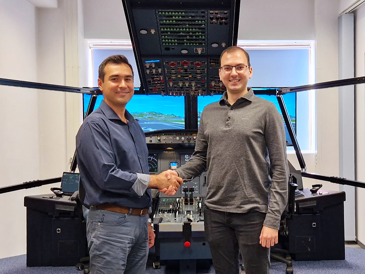 Mr Dragos Voinea, Carpatair's Nominated Person Training (left) and Mr Tudor-Adrian Gînga, Simnest Aviation's Chief of Software Engineering (right) after the successful on-site acceptance.